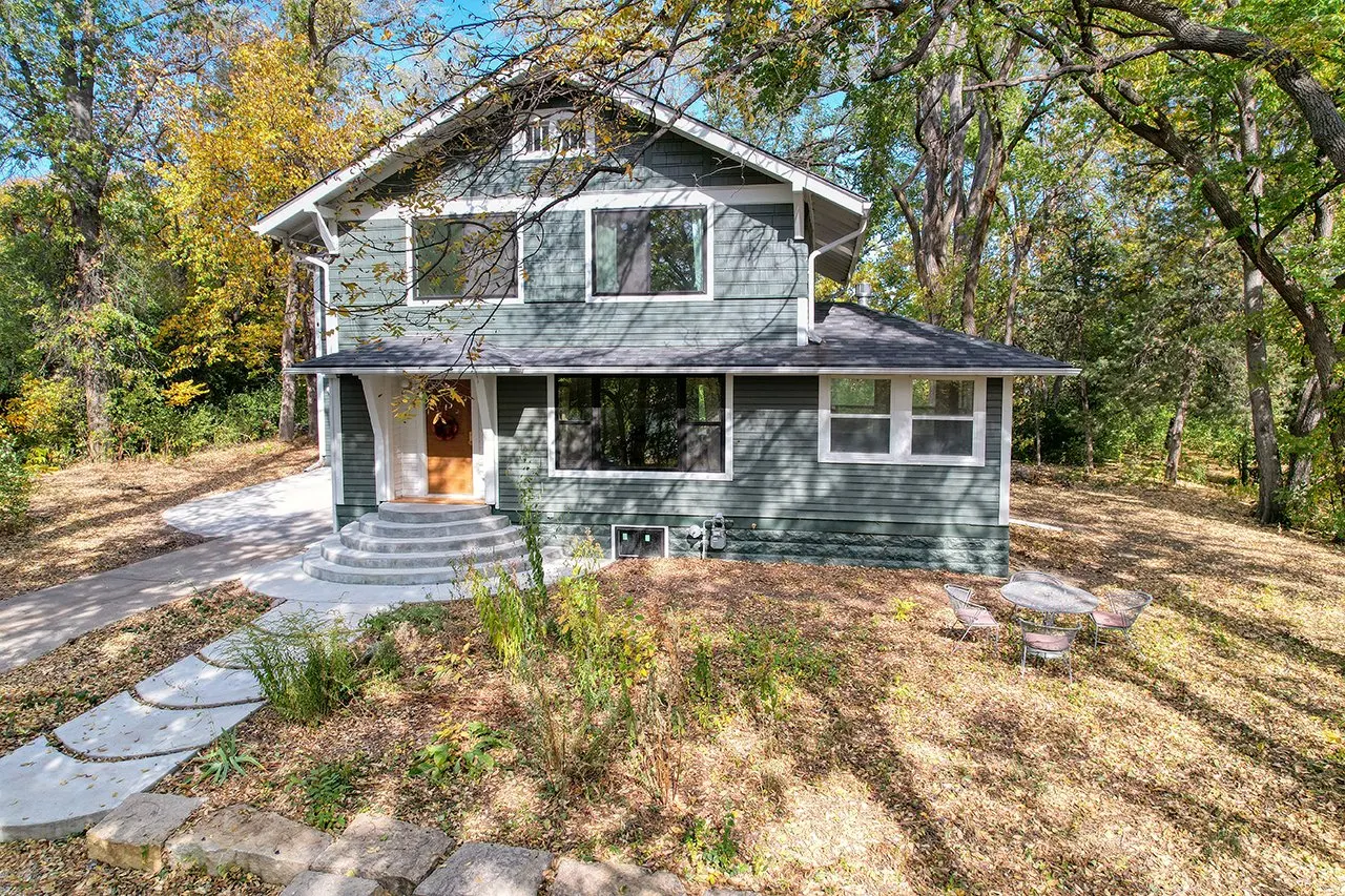 Forest House Exterior, Home Remodel, craftsmanship, custom cement patio.